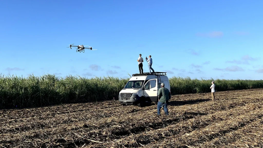 image of agricultural Drone spraying using the DJI Agras T40 in Plant City Florida