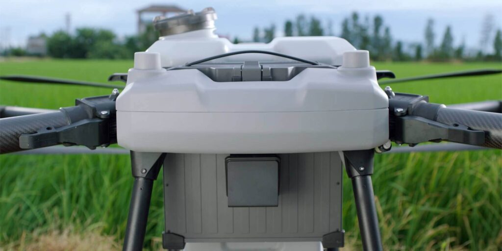 image of agricultural drone spraying Agras-T40 container