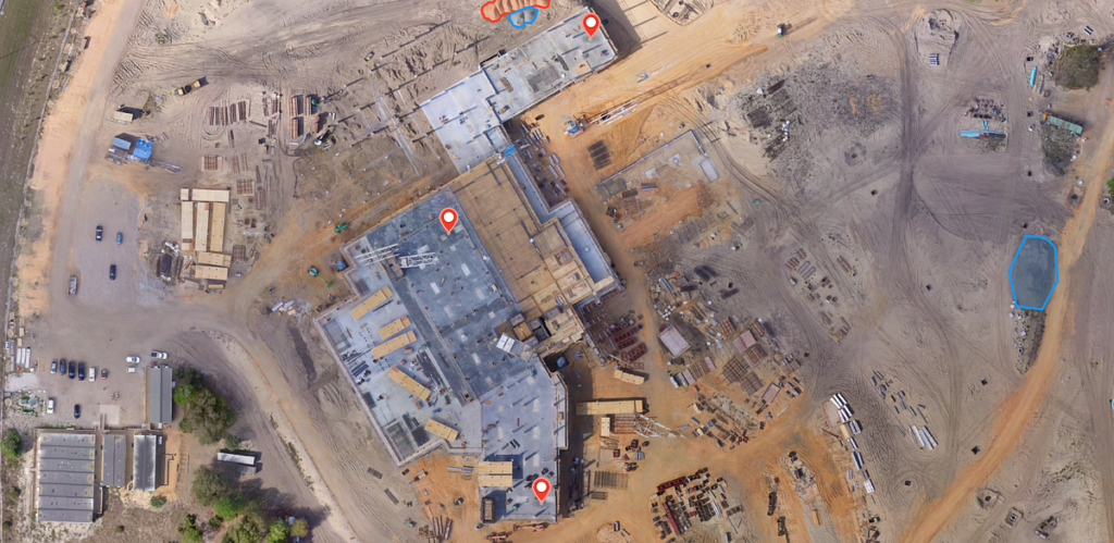 image of overhead drone security check of construction site.